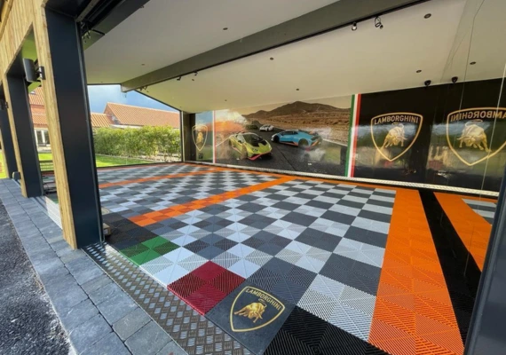 Two door garage with tuff-tile flooring in mixed colored tiles of white, orange and grey